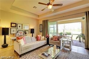 Open family room with coffered ceiling and open vi