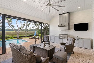 Screen porch with outdoor kitchen.