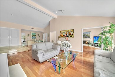 Living Room View of Dinning Area and into Family Room.