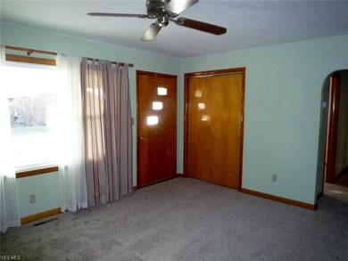Formal living room is 15 x 11 with new wall to wal