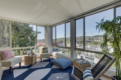 Enclosed sunroom allows for indoor/outdoor living year round.