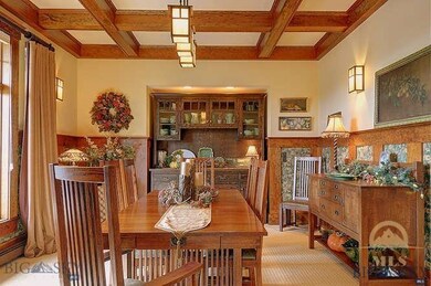 Dining w/ boxed beam ceiling