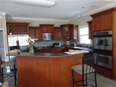 The working area of this huge kitchen is wonderful