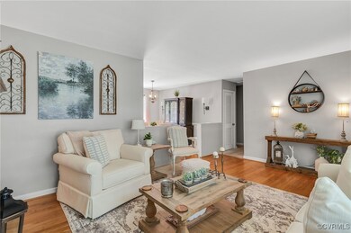 Living area featuring light wood finished floors a