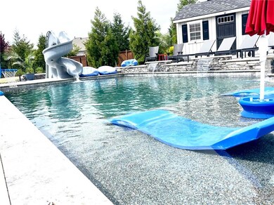RESORT Level Pool with waterfalls, hot tub, and water slide!