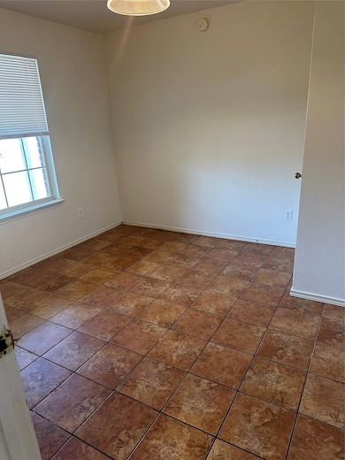 Empty room with baseboards