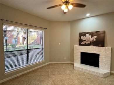 Second view of living area, plenty of natural ligh