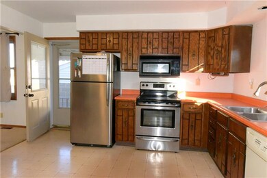 Kitchen with walk to the Backyard