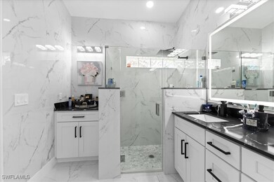 Bathroom featuring vanity and walk in shower
