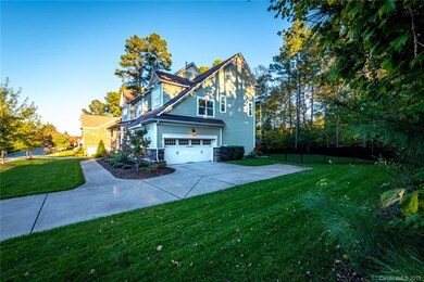 Great side load garage, black aluminum fenced yard