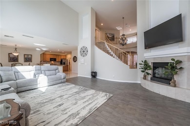 Large family/living area with grey plank flooring.