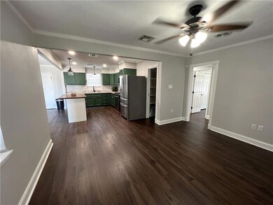 Another view of the Dinning Room! open doorway to 