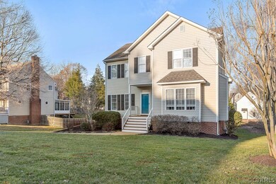 A double width driveway and large parking space at