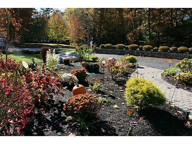 Yard/Garden. Walkway and gardens to...