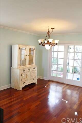 Dining room with 1 of 2 sliding glass doors leadin