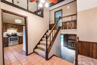 Main level kitchen and dining have vaulted ceiling