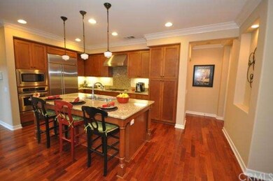 Spacious kitchen with large island, granite and st