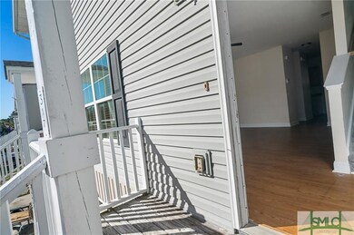 Entry to living area with laminate flooring