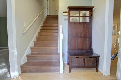 FOYER: The inviting foyer entry offers fresh paint