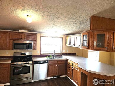 3334 Bluegrass Cir unit 57, Evans, CO 80620 - photo 6