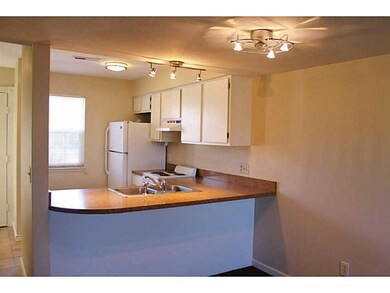 Kitchen. Lots of updates! New stove, refrigerator, light fixtures, and paint.
