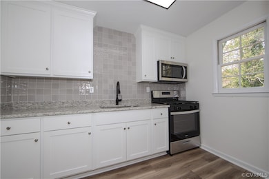 Kitchen with appliances with stainless steel finis