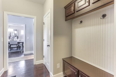 Mud Room Just off the entry way in the Laundry Room with Lots of Space for Coats Shoes Etc.