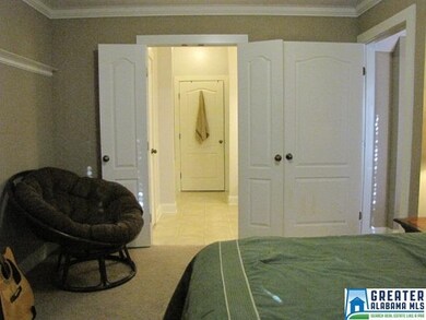 Master looking into master bath and walk-in closet
