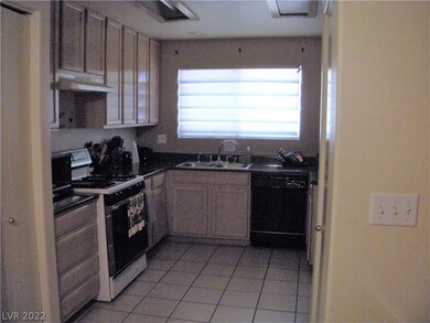 Bright step saver kitchen with Hot Point gas stove