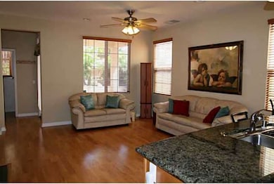 Family room with Laminated wood floors