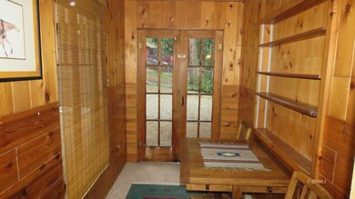 Cozy back sitting area off living room