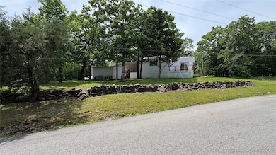 View of front of property featuring a front lawn