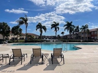 View of swimming pool with a patio