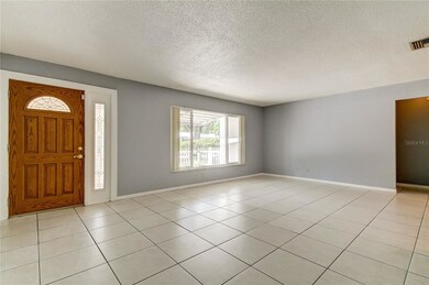 Spacious Living Room with Tile Flooring