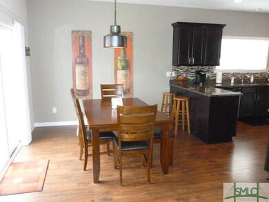 Breakfast Area, Sliding doors leading to Backyard