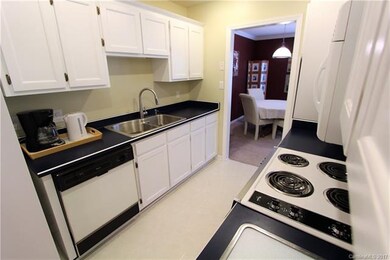 CLEAN KITCHEN with dual sink, nice appliances & freshly painted cabinets.