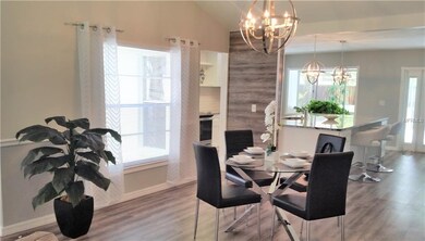 DINING AREA THROUGH TO KITCHEN