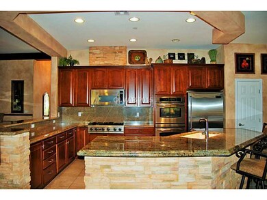 Kitchen. Chef s kitchen with expansive island/brea
