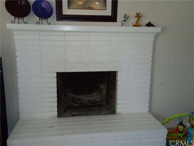 The Living Room Fireplace - One of TWO Fireplaces.