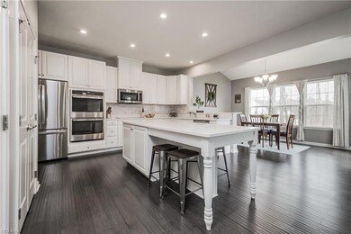 Kitchen Opens to Light Filled Morning Room!