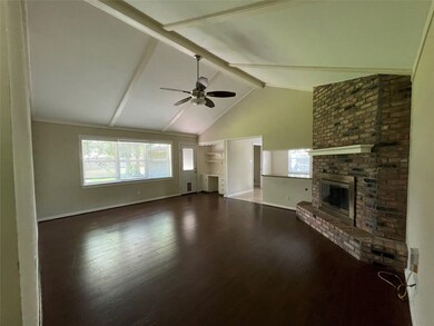 High ceiling in Den and gas fireplace