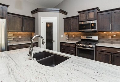 Kitchen with walk in pantry.