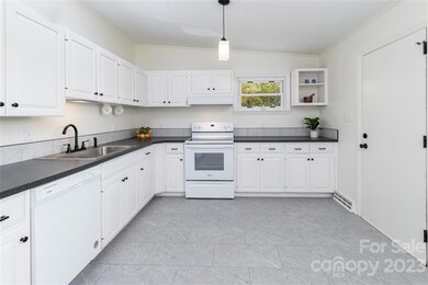 Enjoy the open floor plan with updates and new gas HVAC system.