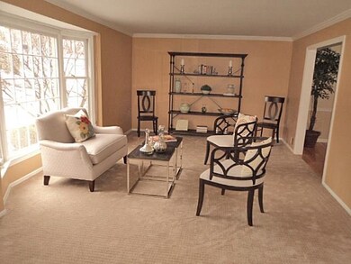 Living room crown moldings new carpeting & walk-ou