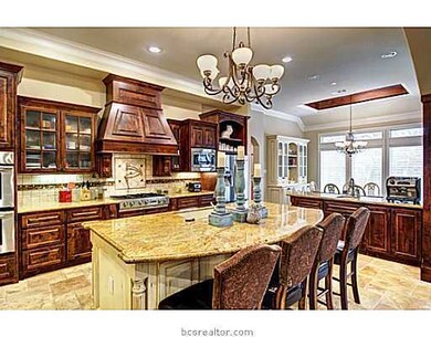 Kitchen. High end appliances, limestone in a Versa