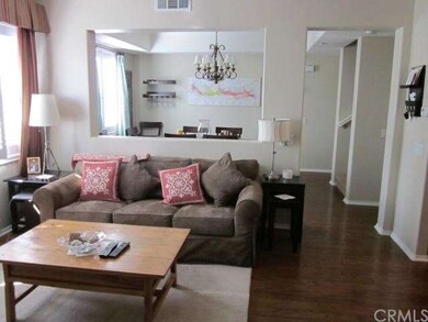 Open living room and formal dining room