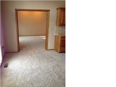 Breakfast area into Living room