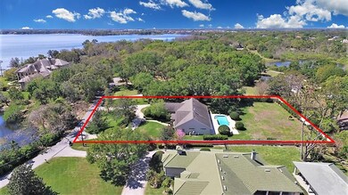 Prime one acre lot with lake views in the front
