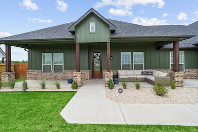 The spacious front porch is perfect for relaxation
