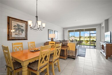 Dining space with a chandelier and light tile patterned floors